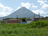 The perfect cone of Volcán Arenal towers over La Fortuna