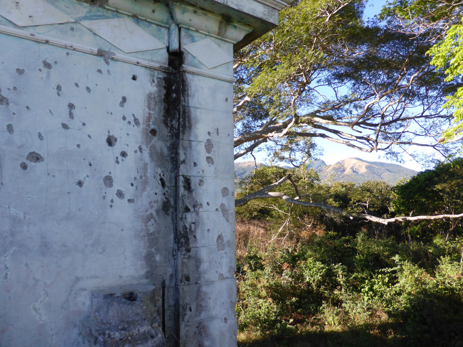 Bullet holes sprayed across the walls of the ex-presidential house