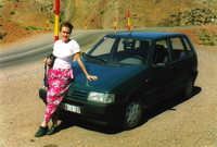 Peta with a rental car