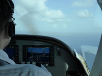 The co-pilot's view of Corn Island as it appears on the horizon