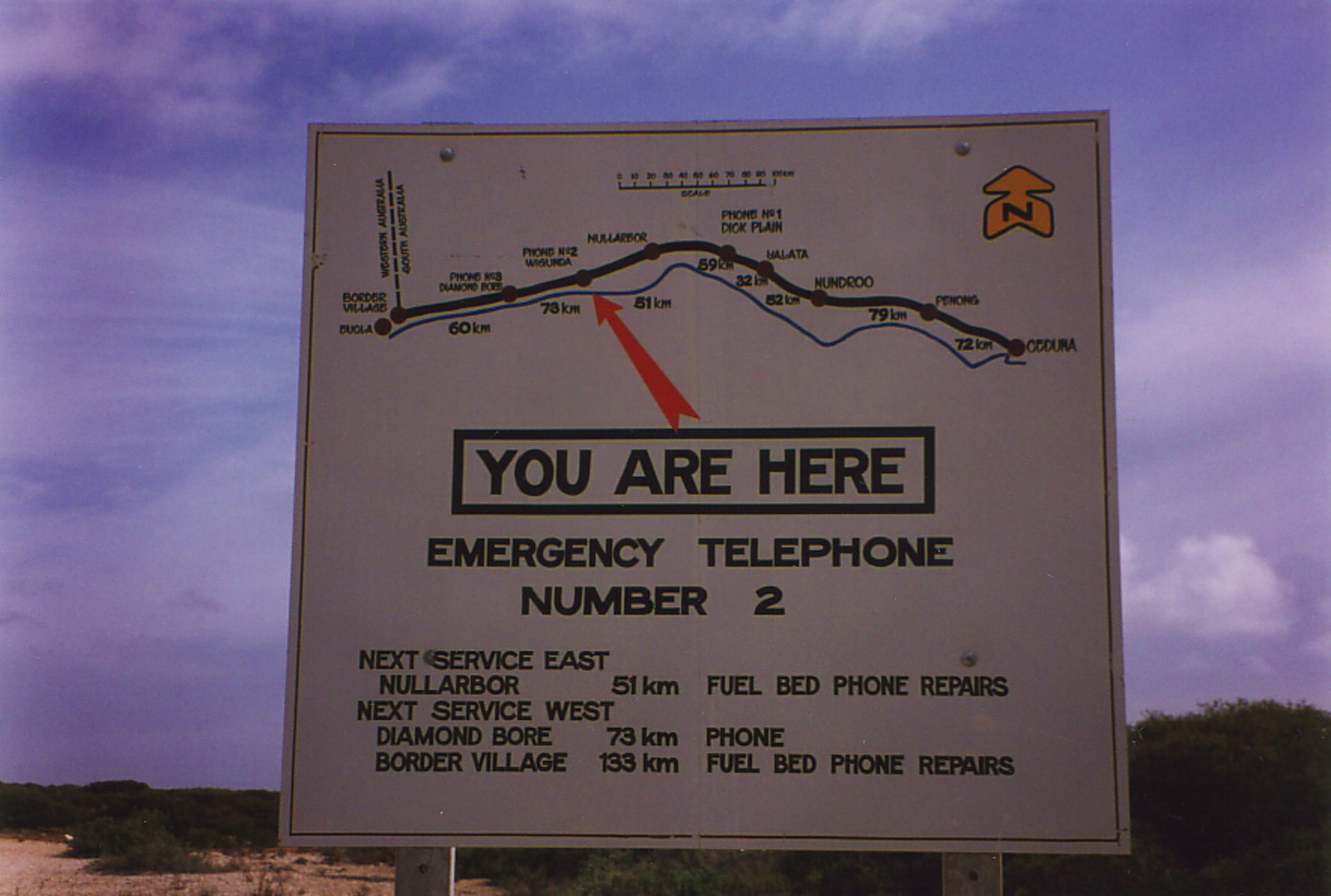 A sign showing the location of emergency telephones