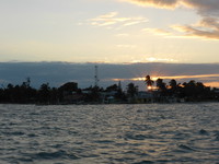 Sunset over Caye Caulker on our way home