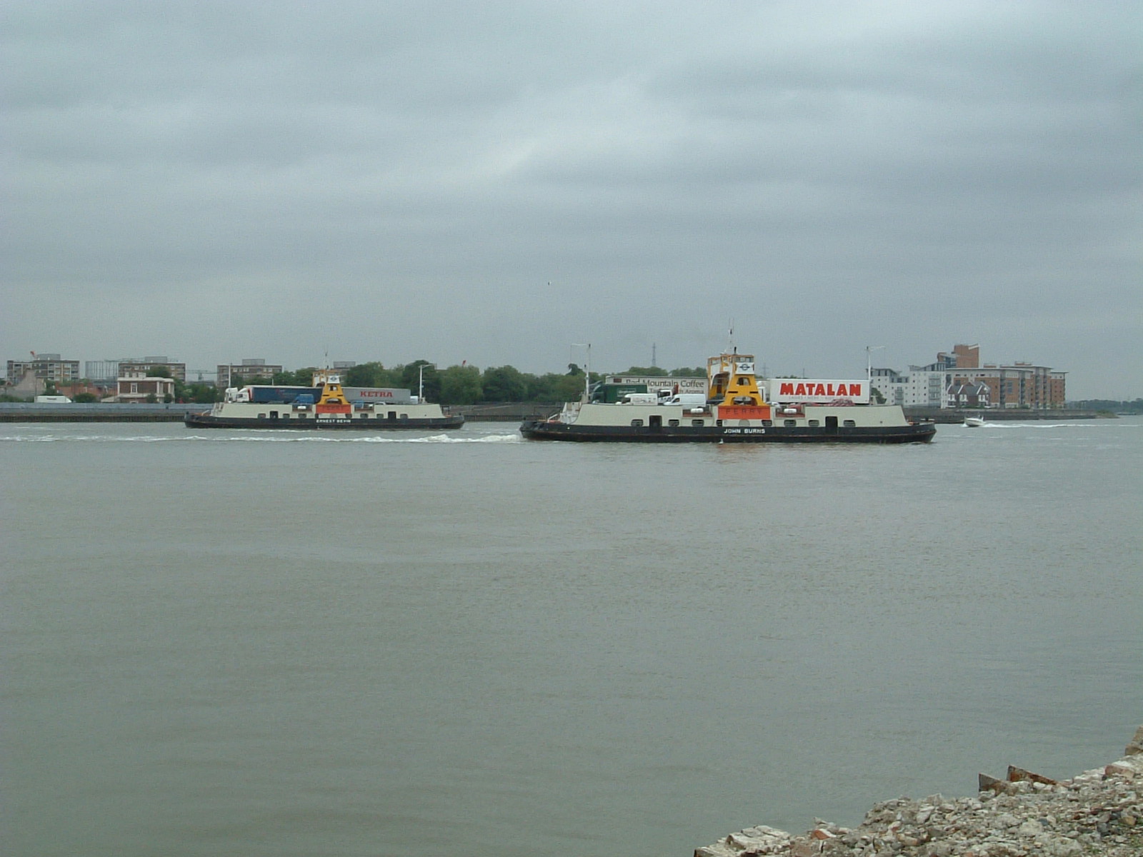 Ferries passing each other as they cross the Thames at Woolwich