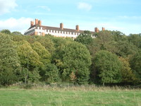 The view towards the Star and Garter Home from the Capital Ring at Petersham Meadow