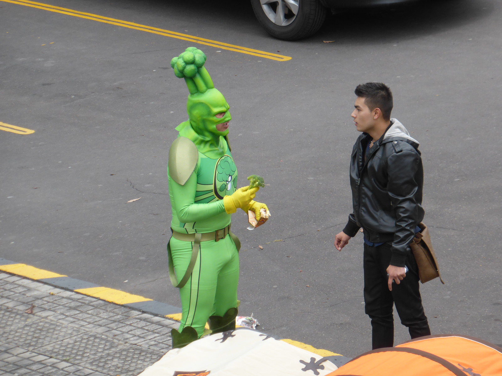A man dressed as a piece of broccoli