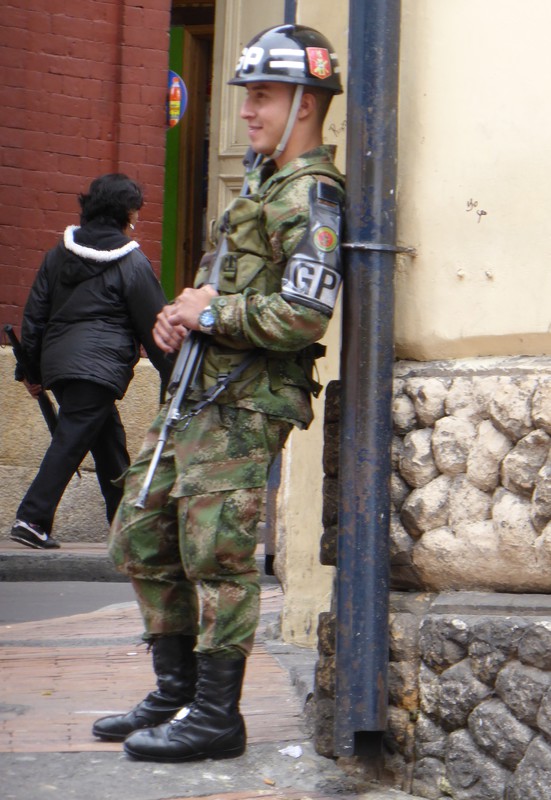 A smiling soldier in La Candelaria, Bogotá