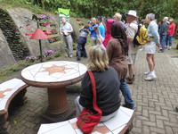 Large groups of tourists flocking round the hummingbirds