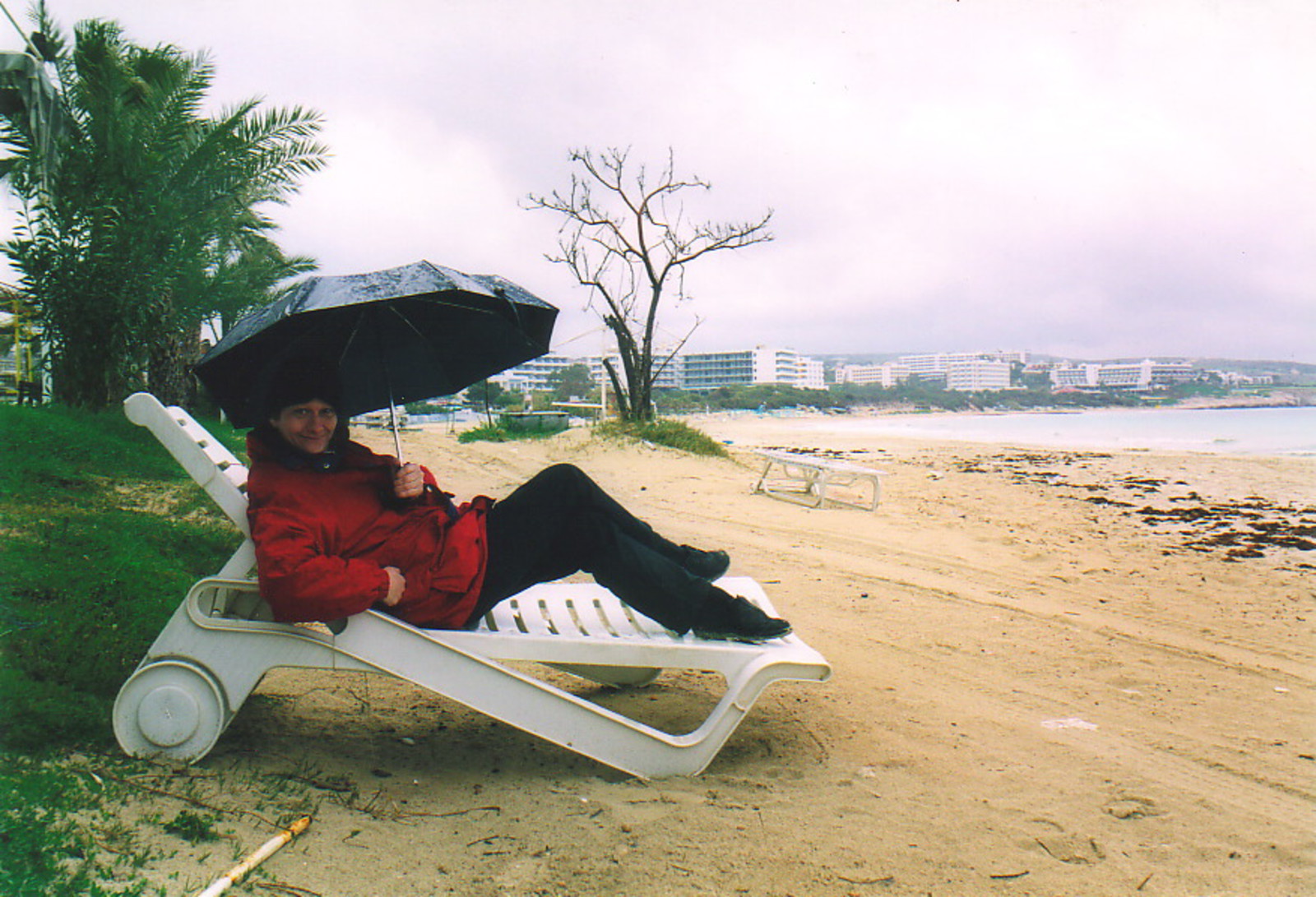 Peta on Agia Napa beach under an umbrella
