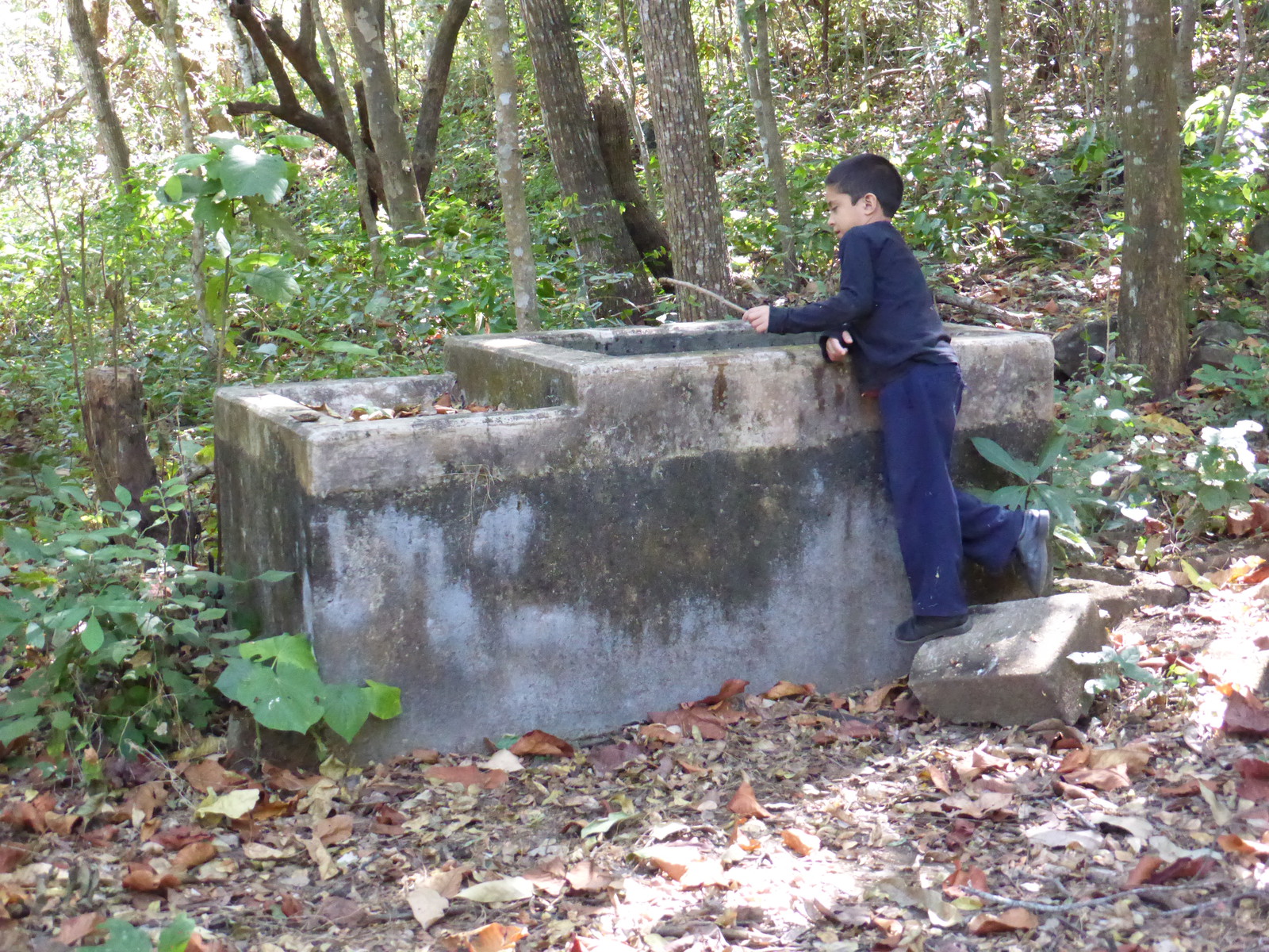 Nelsito playing in the washbasin from his father's old home