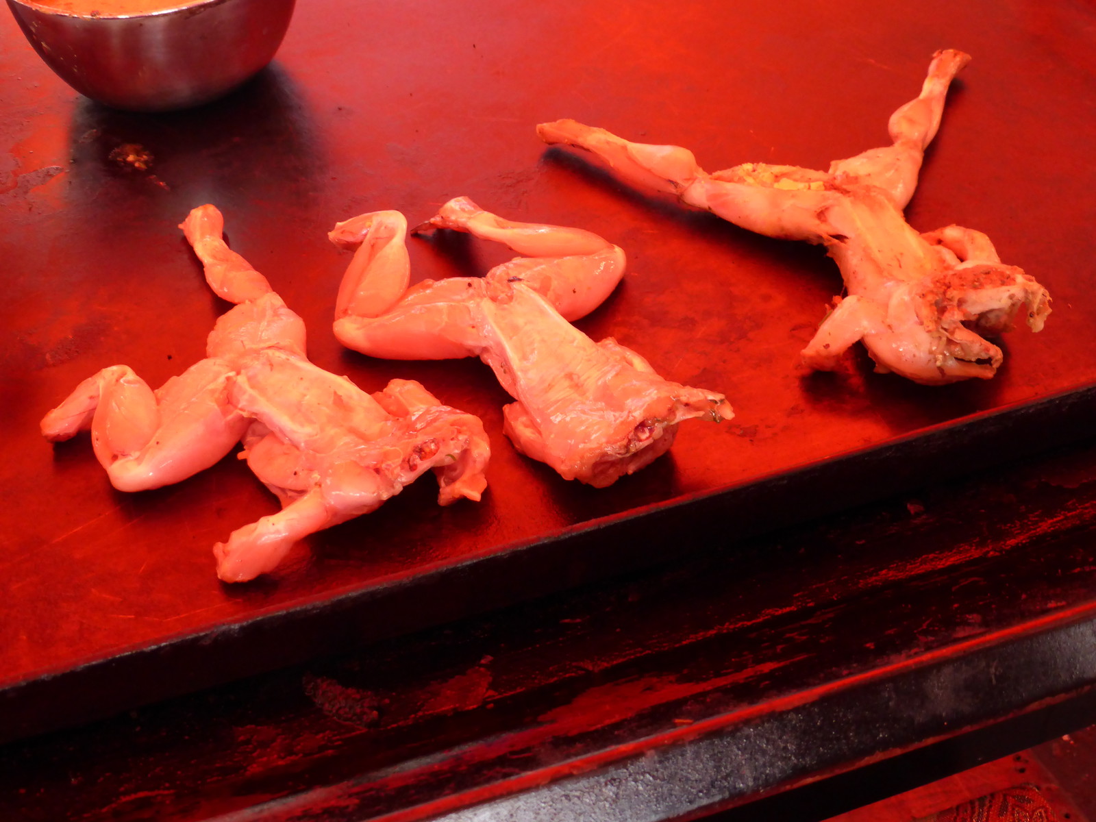 Frogs being barbecued in Juayúa