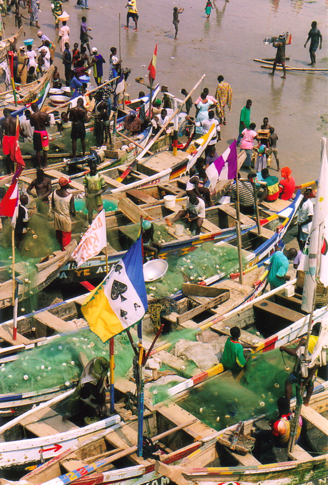 Fishermen on the beach below Cape Coast Castle