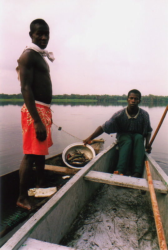 Evans showing off a fisherman's catch