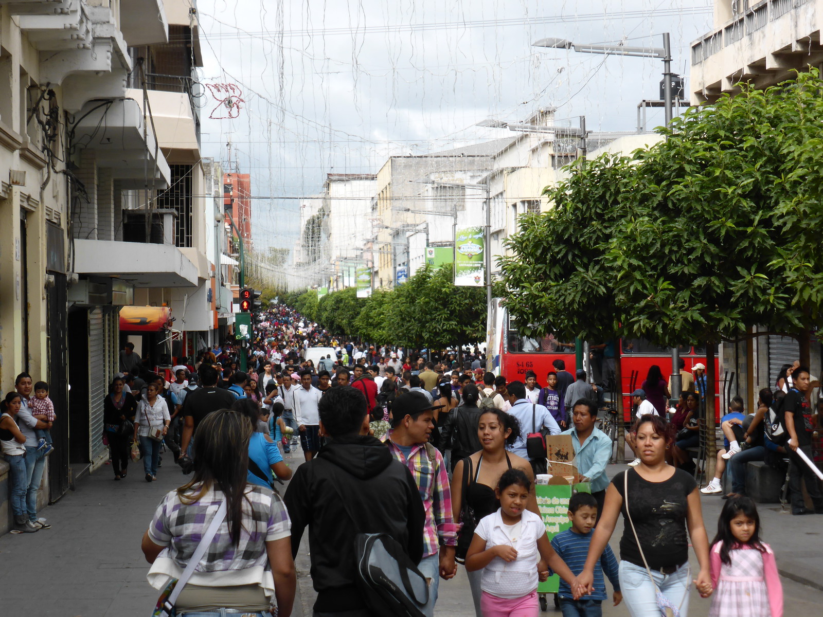 Shoppers on the busy 6th Avenue