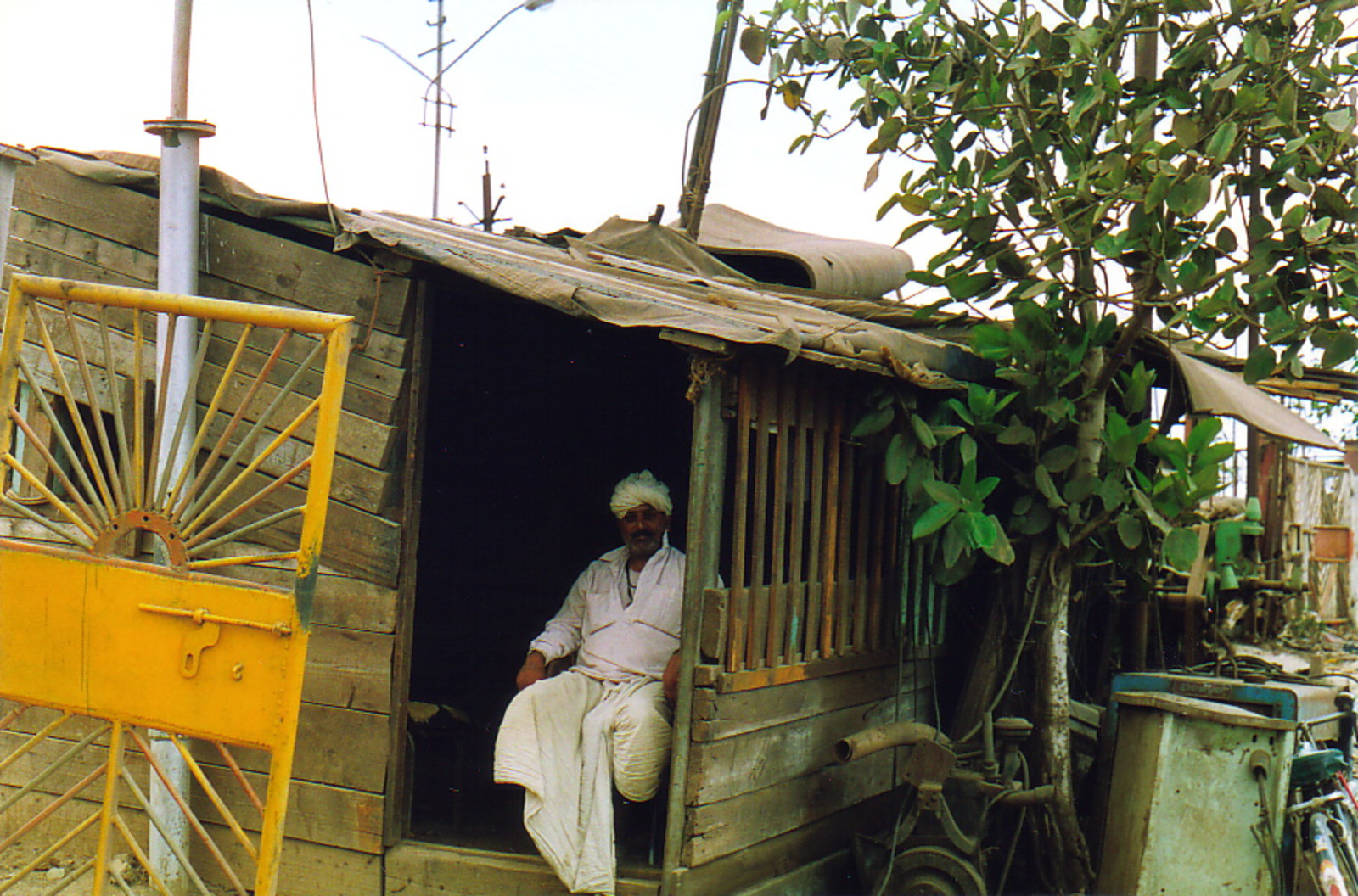 A man sitting by the entrance to a platform