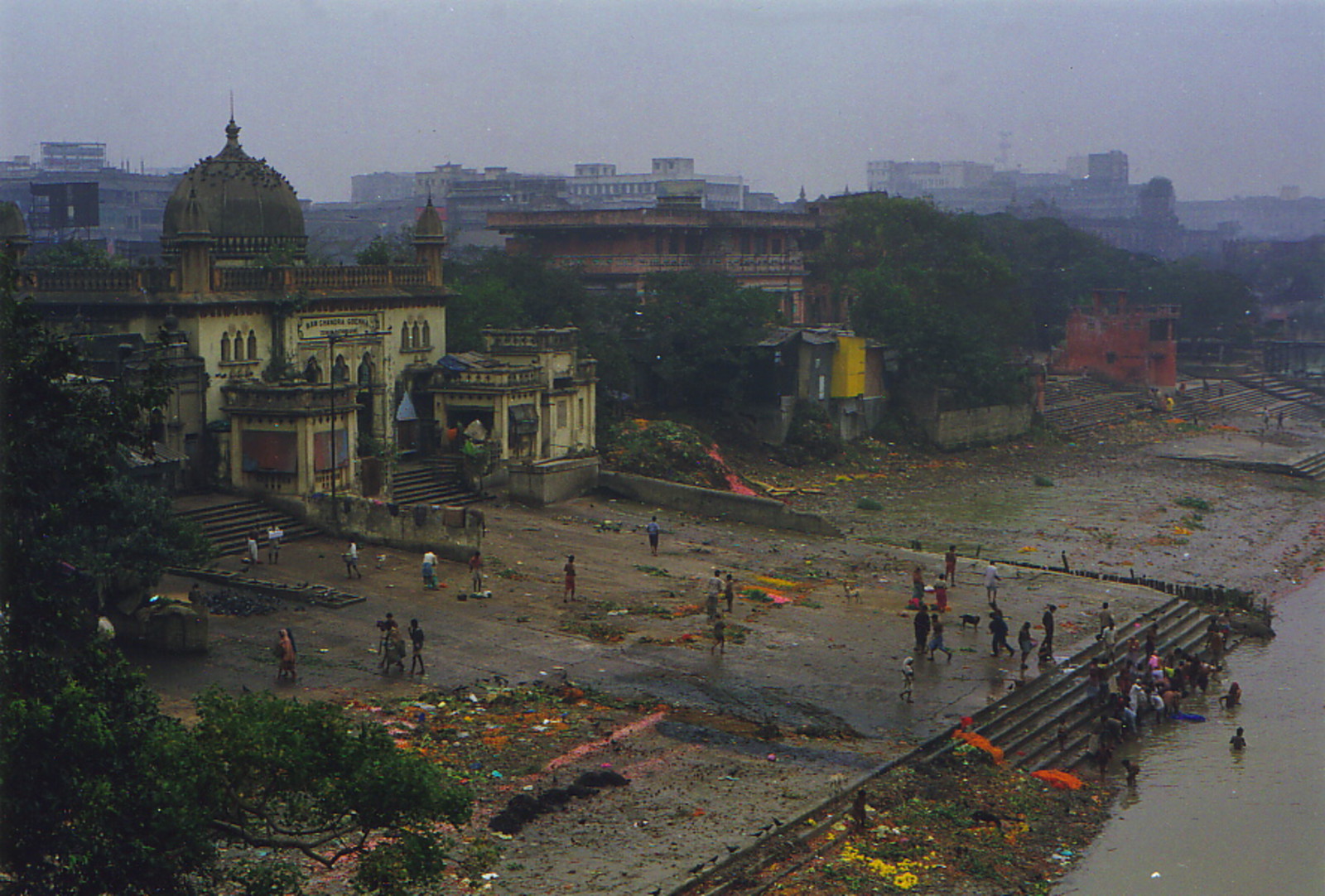 Pilgrims bathing in the River Hooghly near Howrah Bridge