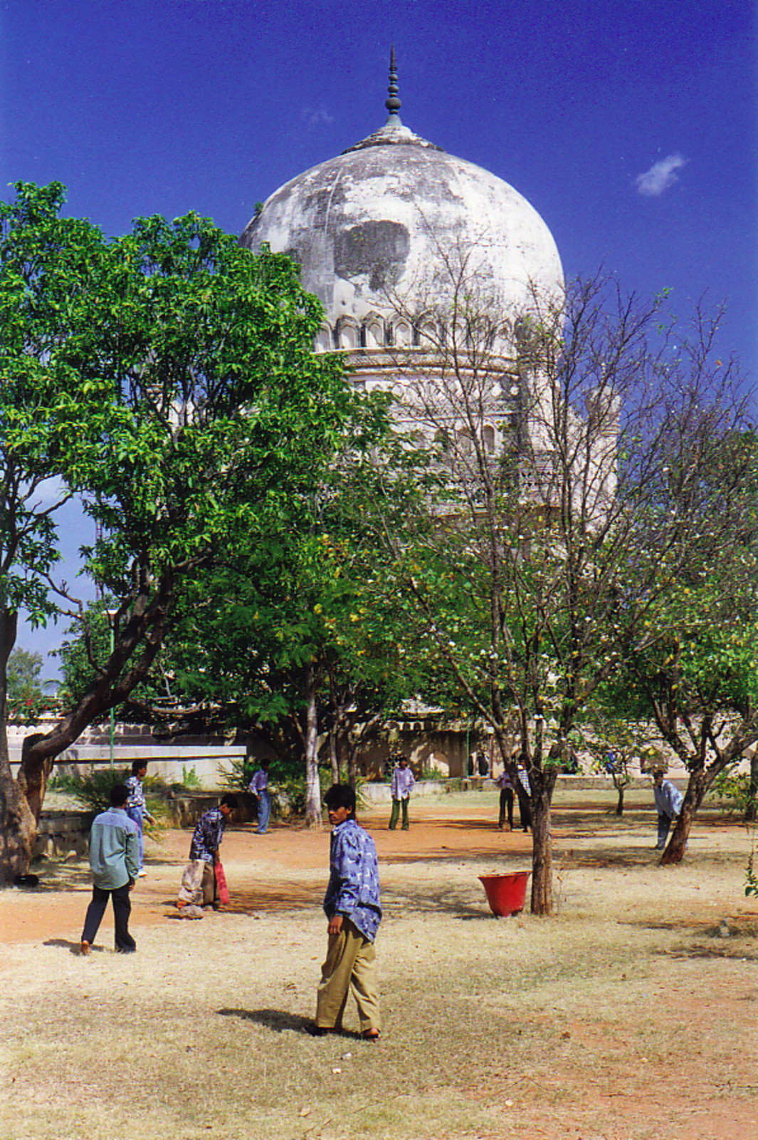 A game of cricket in the Qutab Shahi Tombs in Golconda