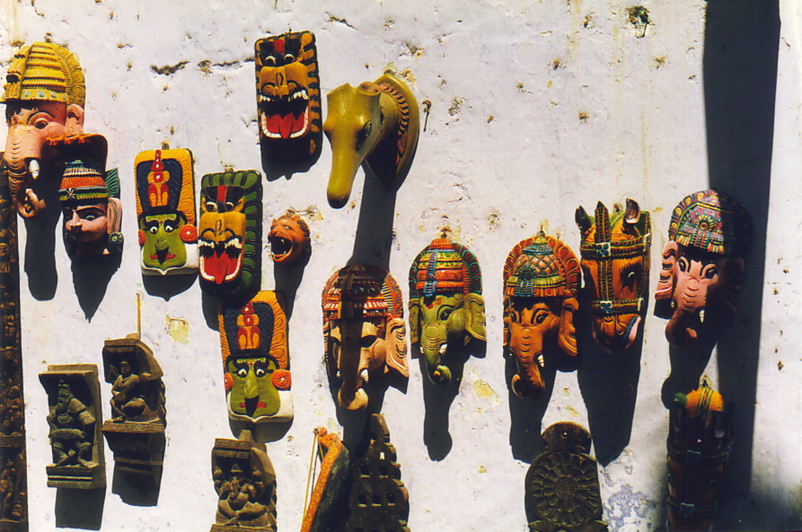 Masks of Ganesh and Kathkali dancers