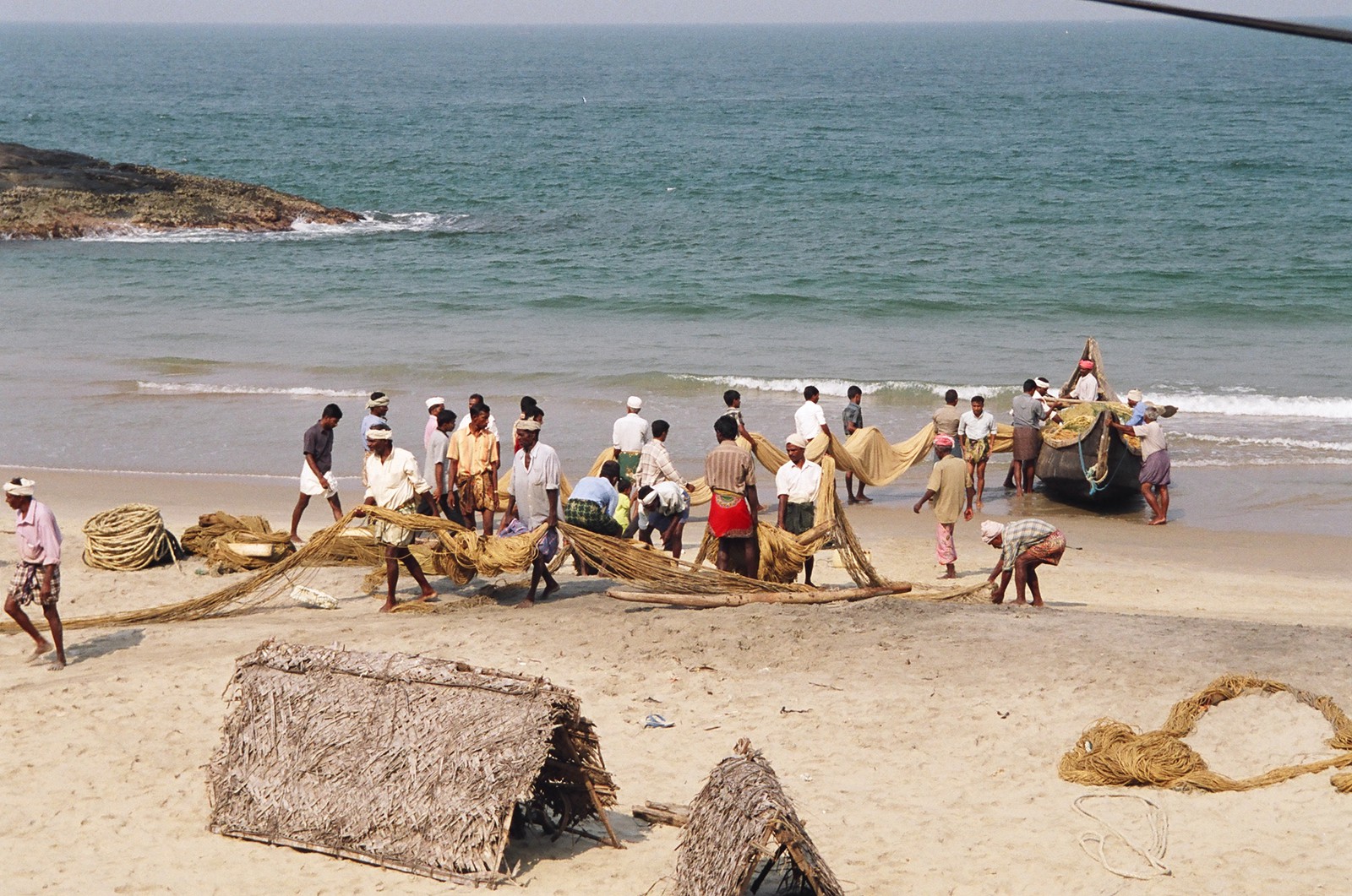 Fishermen readying their boats on Hawah Beach