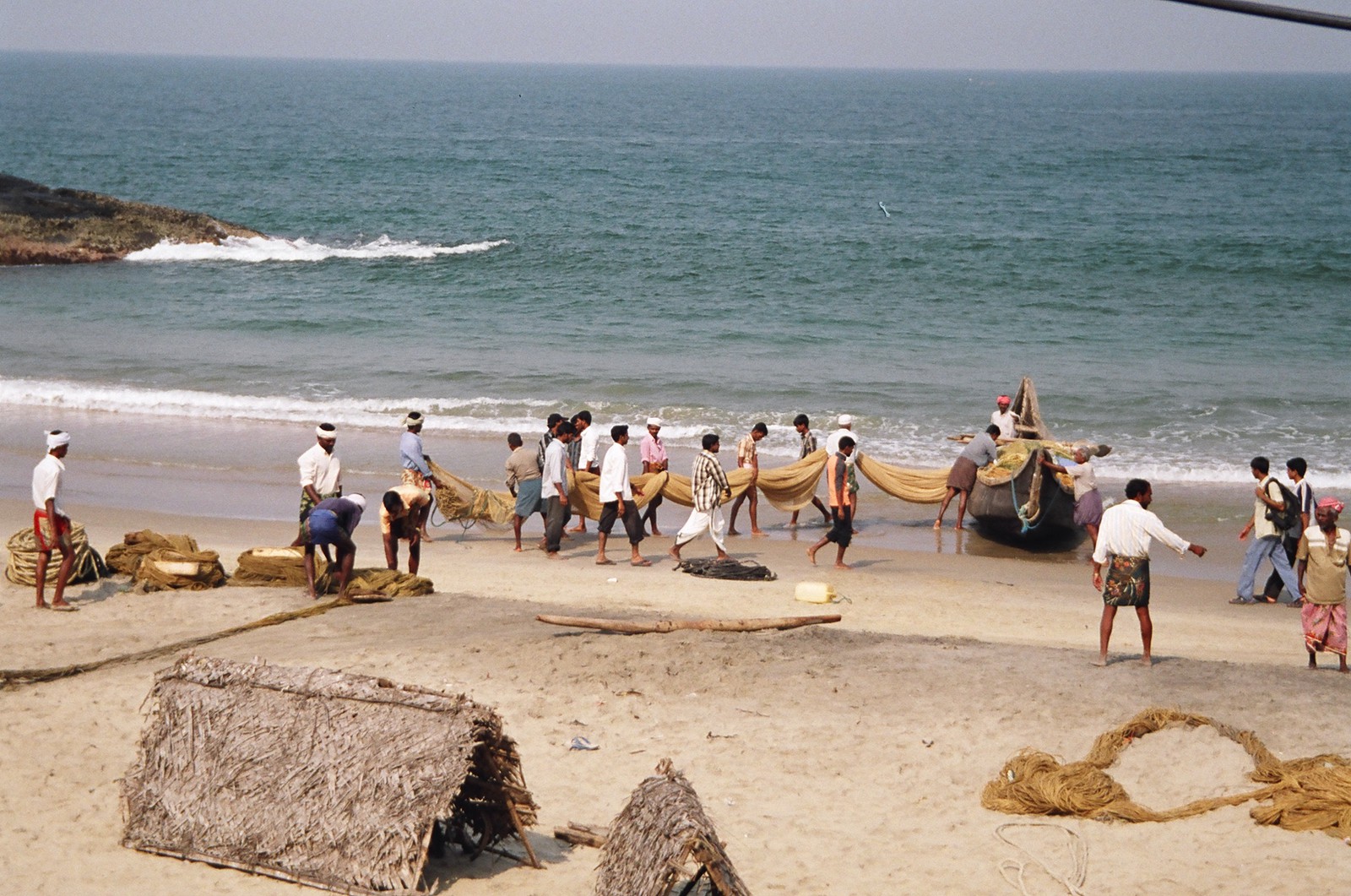 Fishermen readying their boats on Hawah Beach