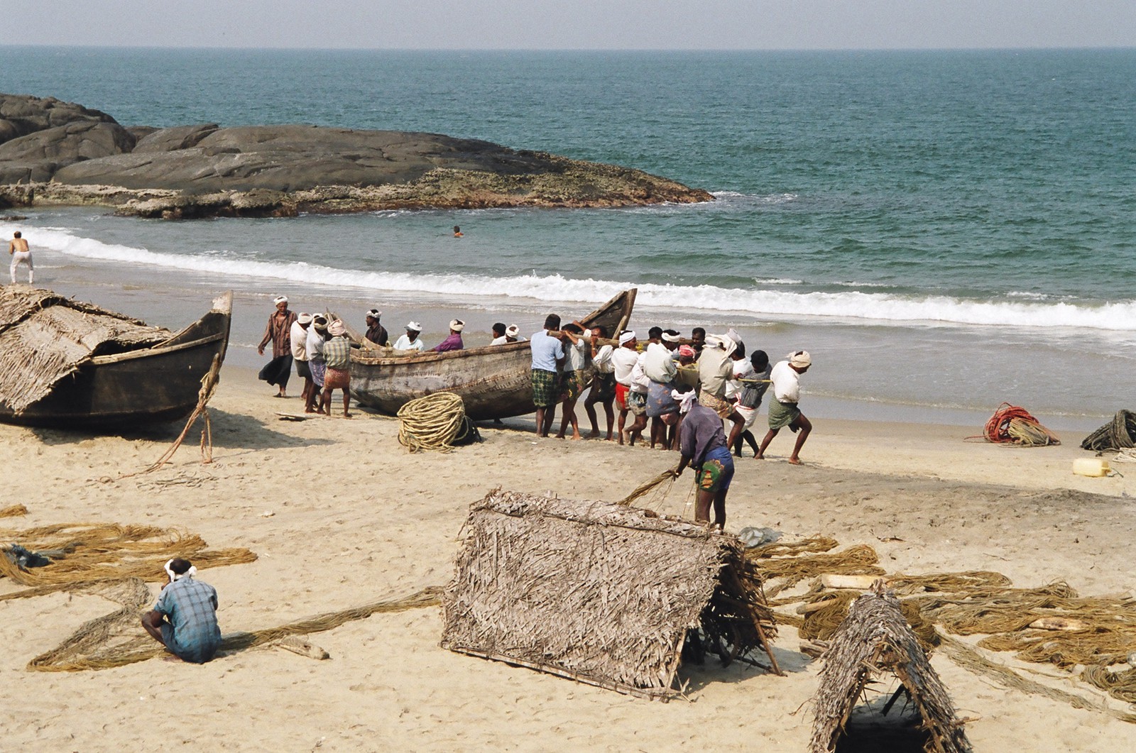 Fishermen readying their boats on Hawah Beach