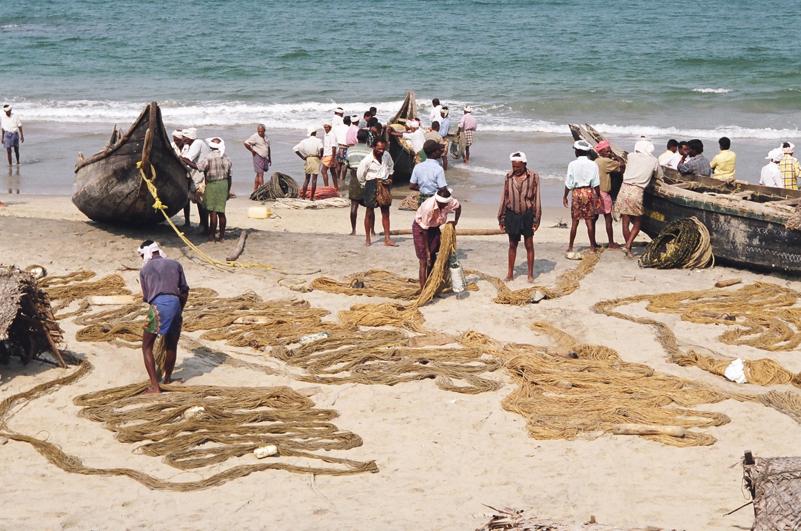 Fishermen laying out their nets to dry on Hawah Beach