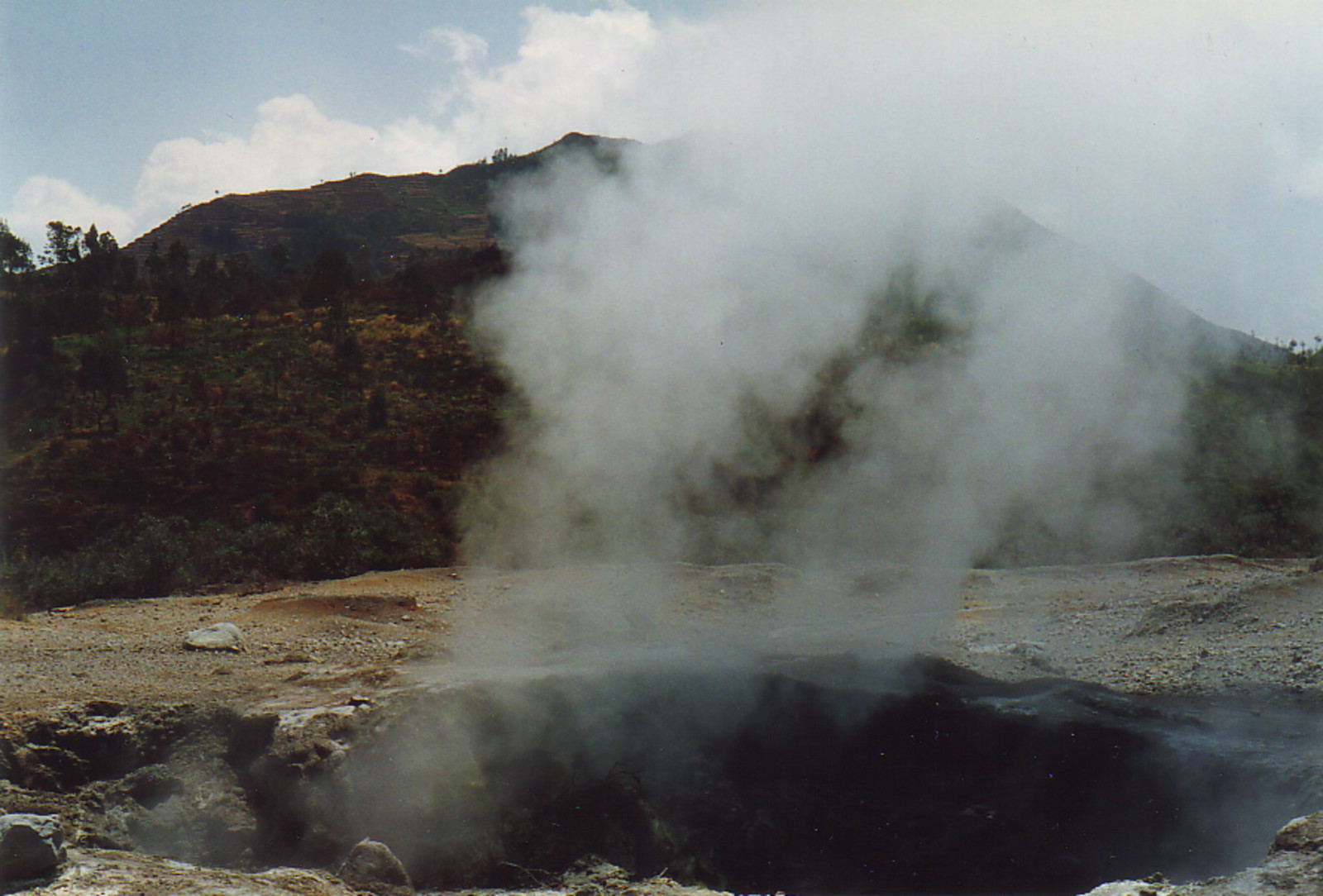 Steam shooting out of a vent at Kawal Sikidang