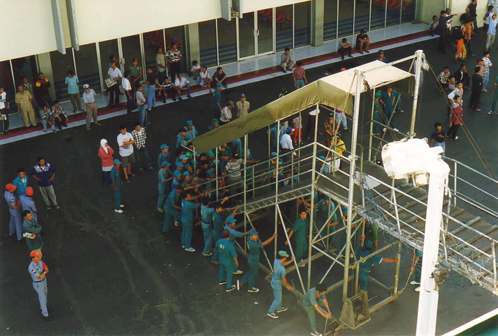 Porters rushing to greet our arrival in Sulawesi