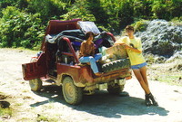 Peter leaning against a jeep