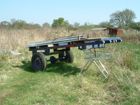 A trailer and shopping trolley on the way to Grim's Dyke Golf Course