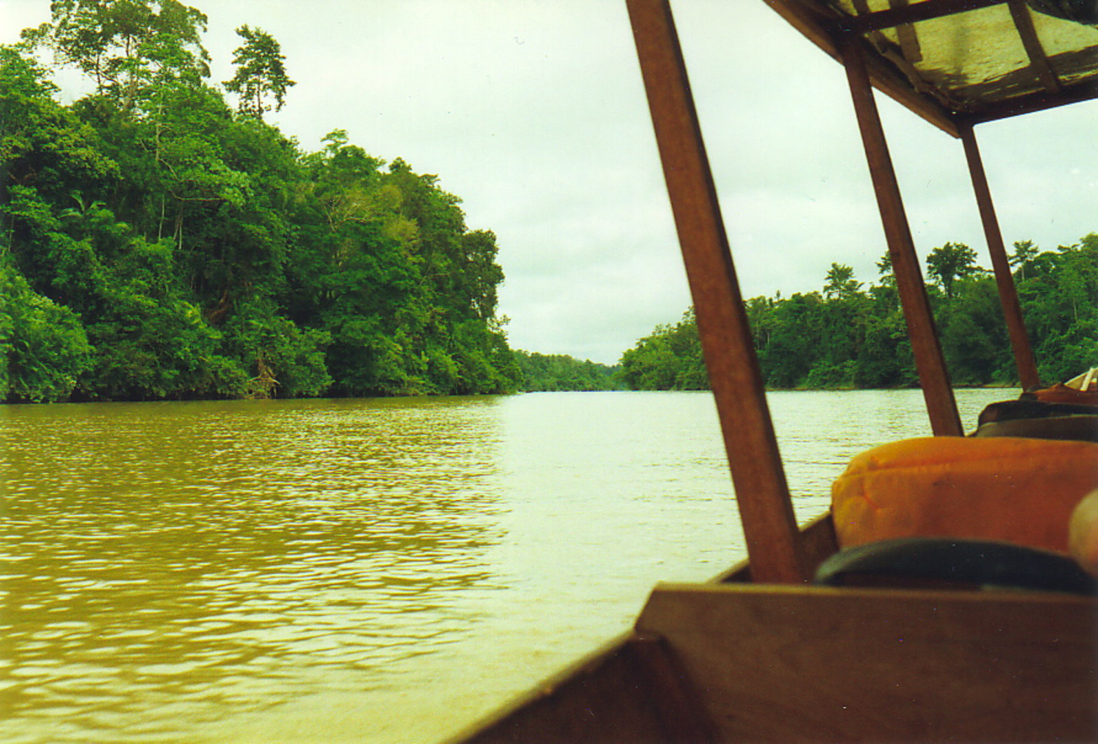 A boat sailing up the Sungai Temering