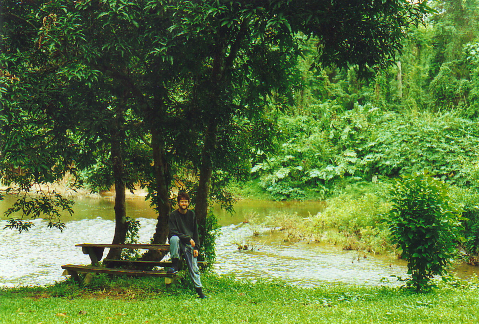 Mark relaxing by the river, six days from civilisation