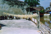 Fish drying by the river in Old Melaka