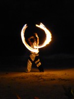 Fire juggling on the beach at Fusion