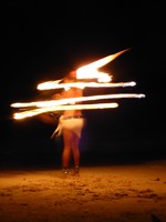 Fire juggling on the beach at Fusion