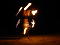 Fire juggling on the beach at Fusion
