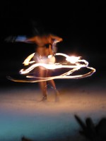 Fire juggling on the beach at Fusion