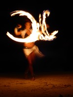 Fire juggling on the beach at Fusion