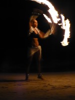 Fire juggling on the beach at Fusion