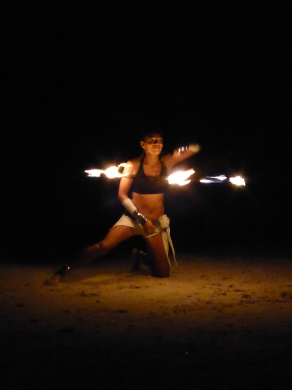 Fire juggling on the beach at Fusion