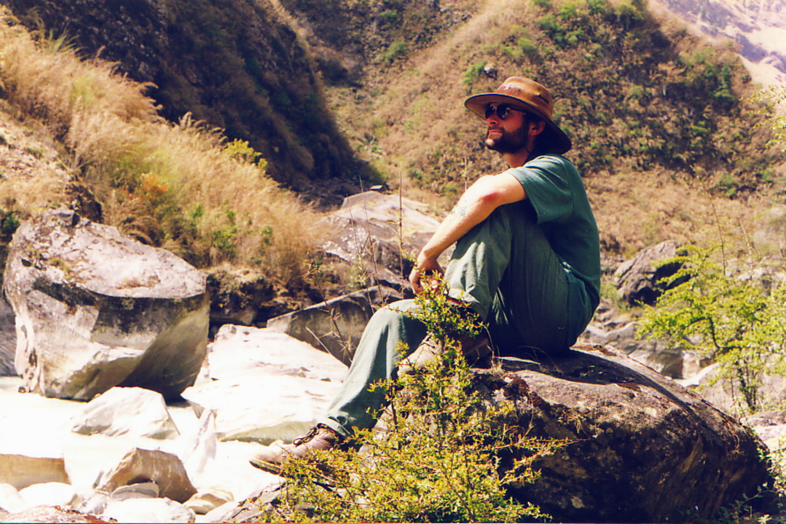 Mark sitting on a rock