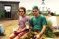 Greg (right) and Thomas celebrating on top of Rangitoto with a bottle of Queen Adelaide