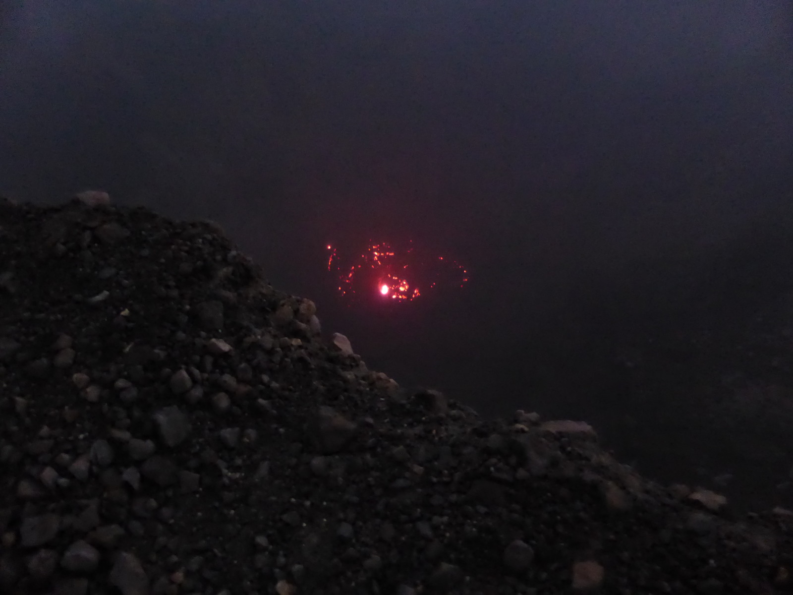 The hellish glow of lava 120m down in the middle of the crater