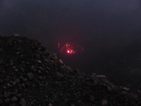 The hellish glow of lava 120m down in the middle of the crater