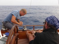 Jan trimming the sails, with a little help from Mark