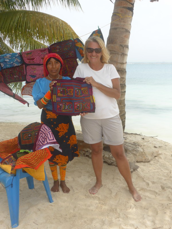 Peta with the Kuna and one of the molas we bought from them