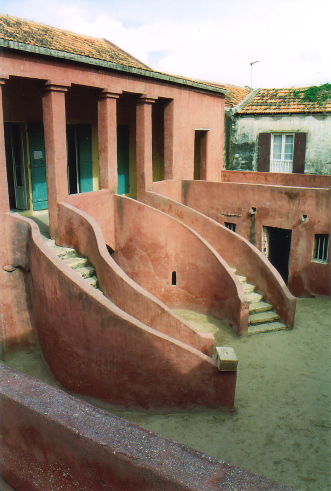 A staircase inside the Maison des Esclaves