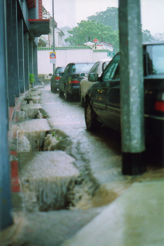 Rain pouring down the streets of Singapore