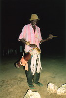 A Gambian musician playing the drums