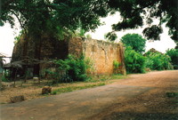 Ruined warehouses by the River Gambia