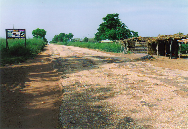 A pot-holed road